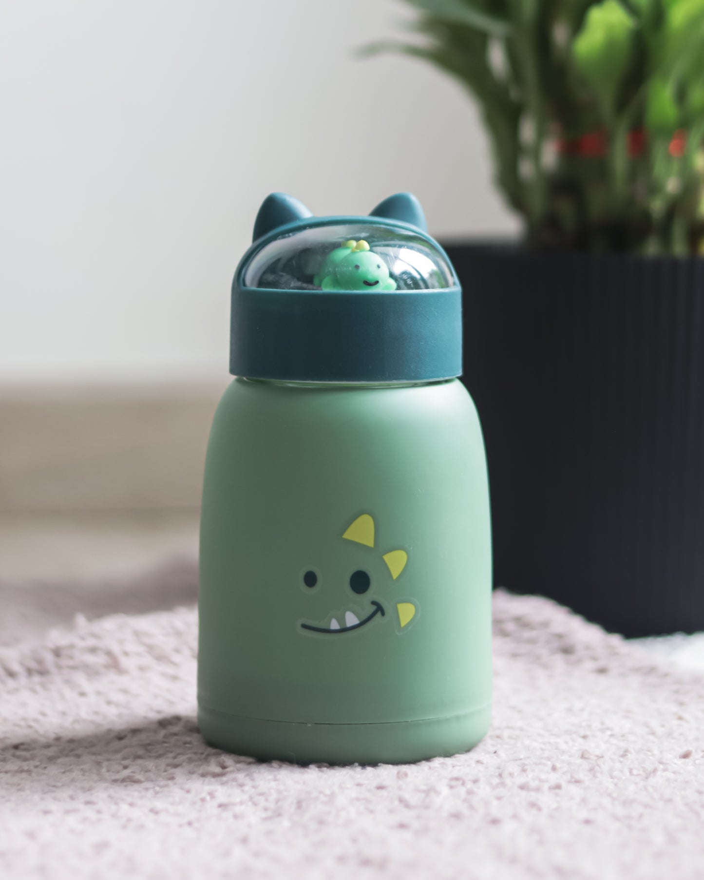 Adorable Kids' Bottle with Toy Lid and Plastic Shield