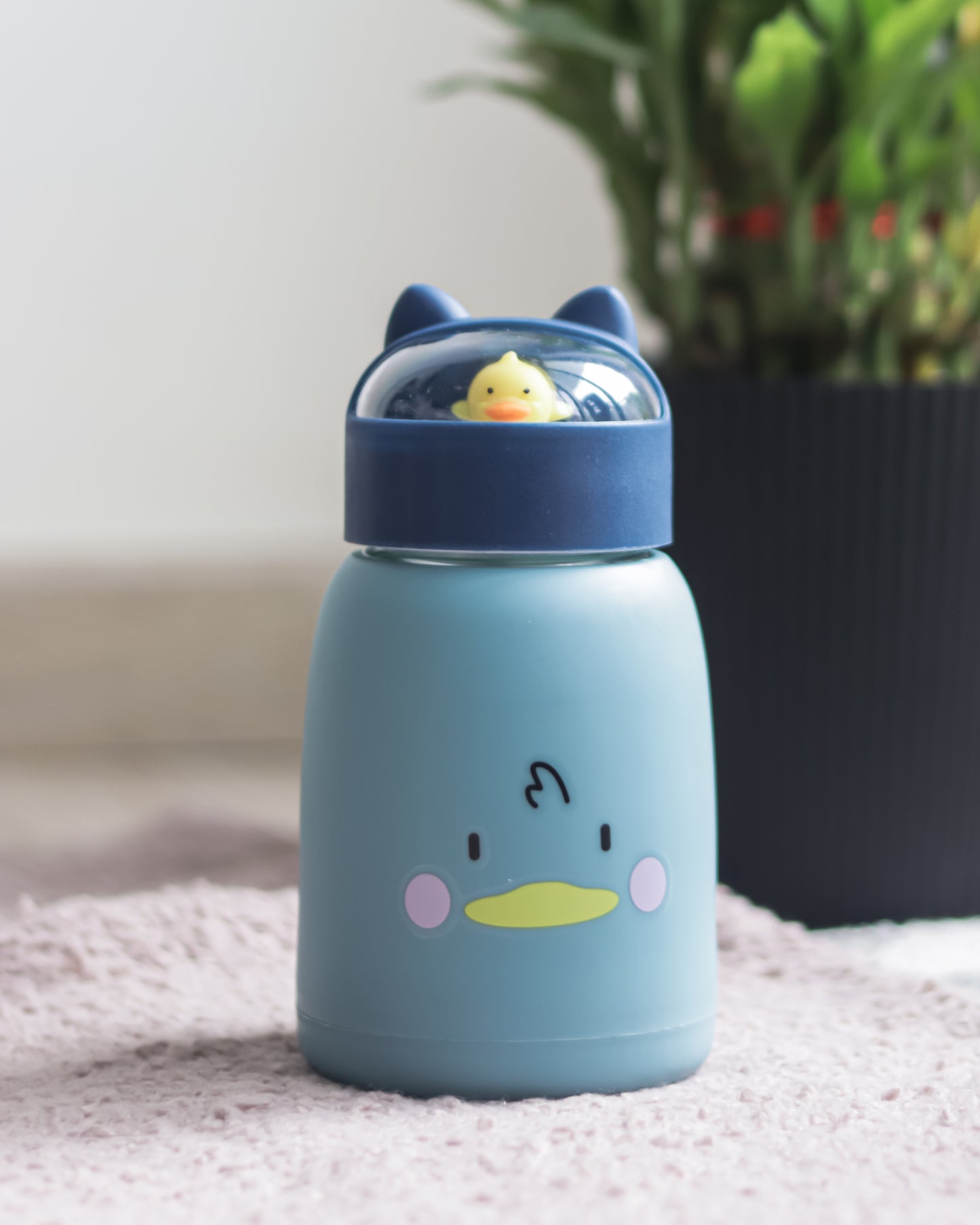 Adorable Kids' Bottle with Toy Lid and Plastic Shield